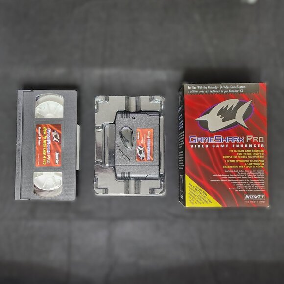 N64 Game Shark Pro  V 3.3 With original box and VHS Tape - Picture 8 of 13